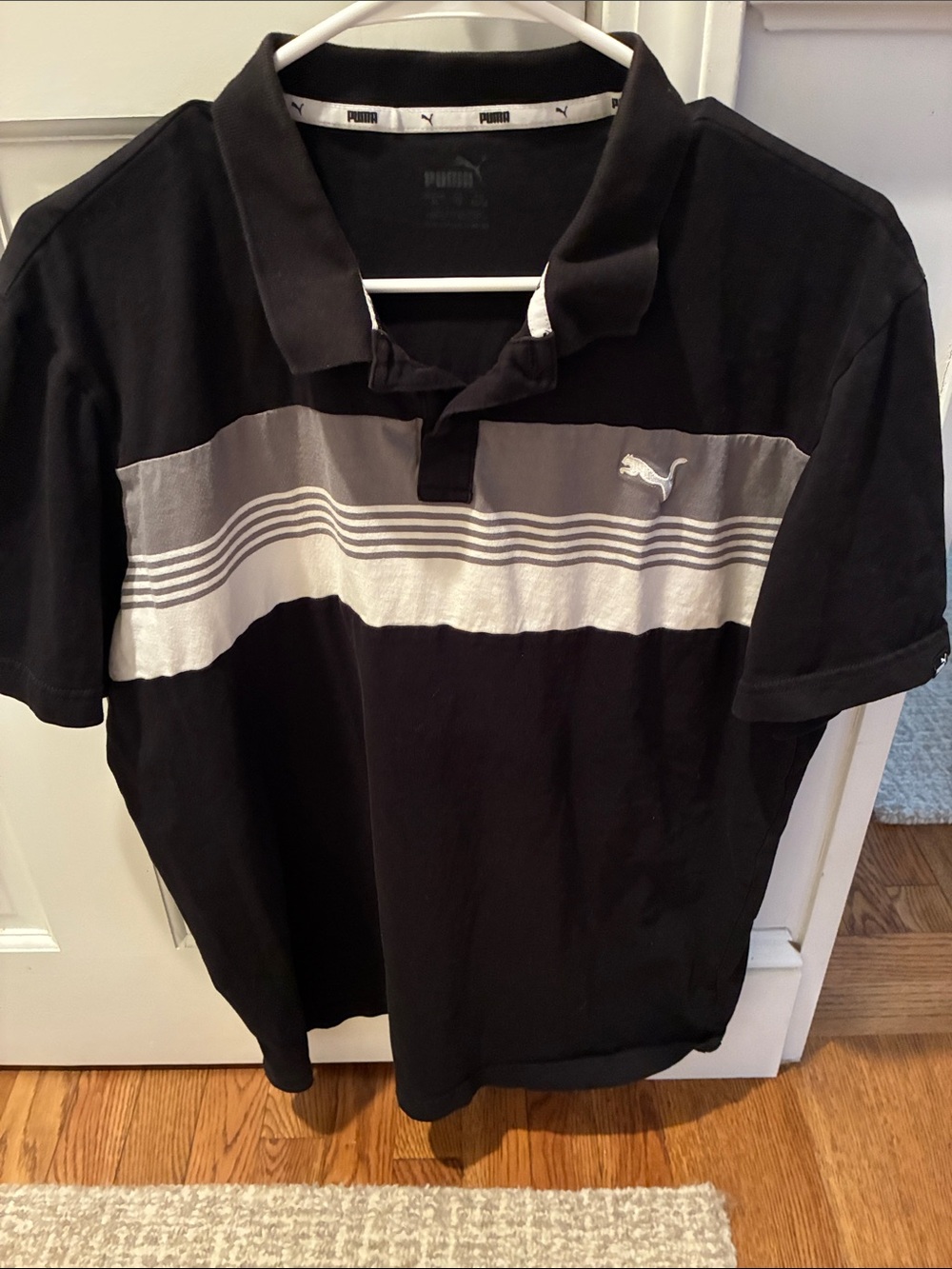 Puma Black Polo with Gray Chest Stripe